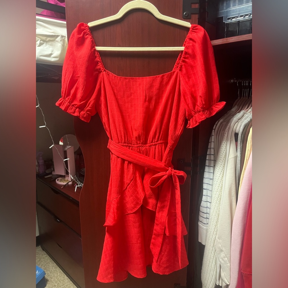 red sun dress with decorative bow
